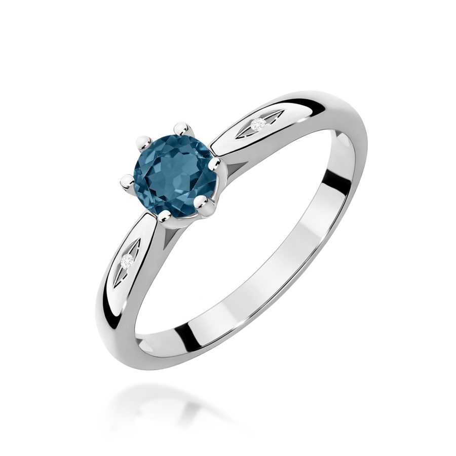Pierścionek z białego złota z topazem London Blue i diamentami · W074